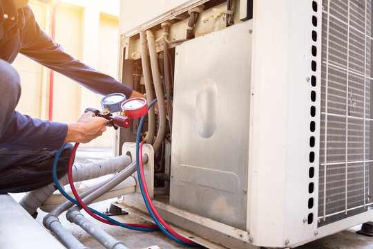 Licensed electrician working on residential panel